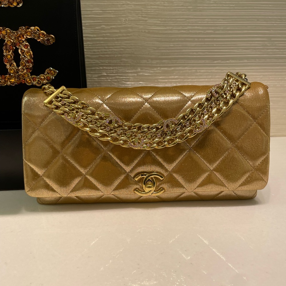 Chanel Brand new Gold Clutch with metal chain